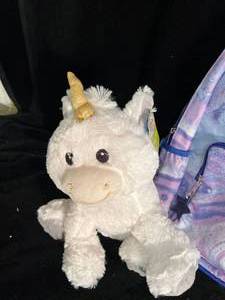 lot 93 image: New Backpack and Stuffed Unicorn