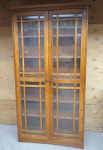 lot 2 image: SOLID WOOD MISSION GLASS BOOKCASE