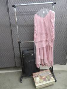lot 48 image: ROLLING CLOTHS RACK  SUITCASE   PLUS