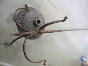 lot 89 image: WROUGHT IRON PLANT HANGER  STEEL STOP SIGN BASE