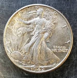 1942 WALKING LIBERTY HALF DOLLAR UNC NICELY TONED (LOOKS BETTER IN HAND)