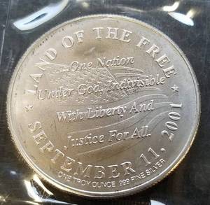 1 TROY OZ .999 FINE SILVER 9-11 WORLD TRADE CENTER ROUND