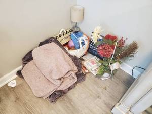 Collection of Books, Dcor, and Blankets