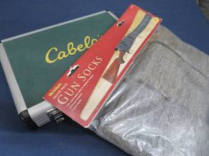 CABALAS GUN CLEANING KIT AND NEW GUN SOCKS