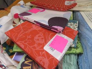 TOTE FULL OF FABRIC