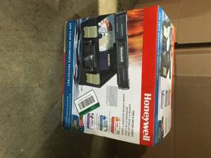 lot 28 image: Honeywell 0.15 cu. ft. Molded Fire Resistant and Waterproof Portable Chest with Carry Handle, Key and Double Latch Lock Customer Returns See Terms on Auction
