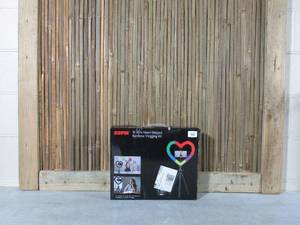 lot 46 image: Sunpak - 10 Heart-Shaped Rainbow Vlogging Kit with Bluetooth Remote