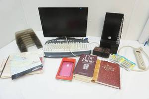lot 103 image: group of office supplies including Samsung Monitor, Microsoft keyboard, etc.