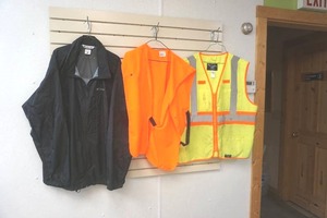 lot 112 image: reflective vest and Columbia Jacket