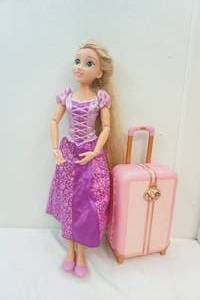 lot 116 image: Life size Rapunzel doll and princess suitcase