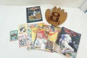 lot 128 image: group of baseball magazines, book, and wall plaque
