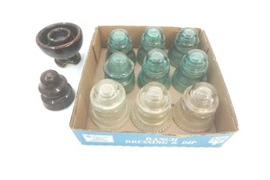 lot 135 image: nine glass insulator and two ceramic insulators