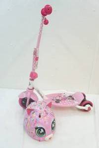 lot 139 image: Minnie mouse scooter and cat helmet