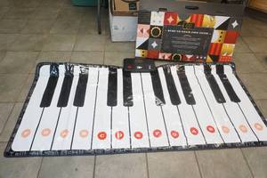 lot 141 image: Floor mat playable piano