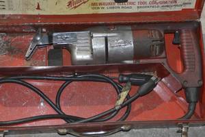 lot 64 image: Milwaukee Heavy Duty Sawzall in case