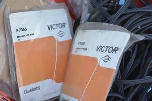 lot 109 image: tote of Ford Motorcraft parts