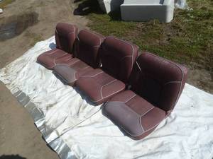 lot 28 image: Boat Seats x 4 Maroon