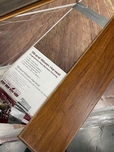 lot 12 image: 12 case Home Decorator Strand Woven Harvest Flooring