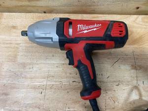 lot 32 image: MILWAUKEE 12 in. Impact Wrench with Rocker Switch and Detent Pin Socket Retention