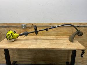 lot 42 image: RYOBI 25 cc 2-Stroke Attachment Capable Full Crank Curved Shaft Gas String Trimmer