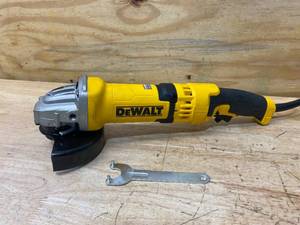 lot 77 image: DEWALT 13 Amp Corded 4-12 in. Angle Grinder