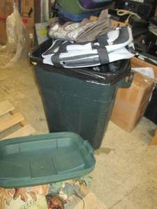 garbage can with tapestry , fake fl...