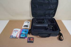 lot 25 image: Sega Game Gear System with Games and Carry Case - Mortal Kombat