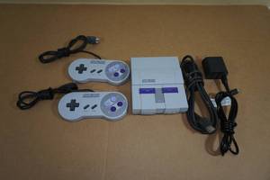 lot 26 image: Nintendo Super Nintendo Mini Plug and Play Video Game System