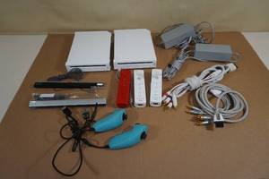 lot 31 image: Nintendo Wii Game Systems with Controllers