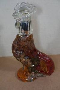lot 79 image: Rooster Infused Oil Glass Bottle