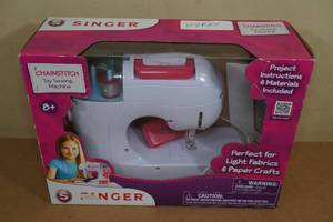 lot 124 image: Singer Chainstitch Toy Sewing Machine
