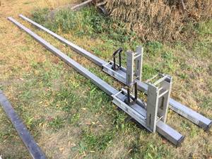 lot 67 image: Pair Alum-A-Pole Pump Jacks