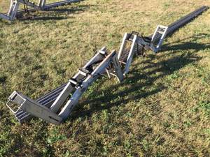 lot 75 image: Pair Alum-A-Pole Pump Jacks