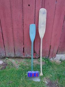 lot 133 image: Qty of 2 paddles. One is warped. As shown.