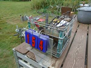 lot 154 image: Milk crate with assorted decoys. As shown.
