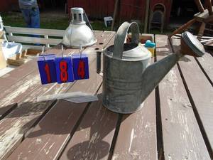 lot 184 image: Galvanized water can with brass spout marked 8. As shown.