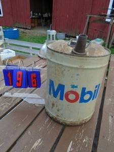 lot 196 image: 5 gal Mobil oil can. Good shape for its age. As shown.