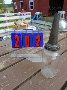 lot 202 image: Oil jar & spout. Amco corp. No chips or cracks. As shown.