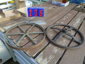 lot 235 image: Qty of 2 vintage pulleys. As shown.