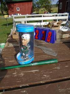 lot 238 image: Minnesota wild hockey bobble head & mini bat. As shown.