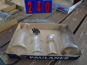lot 240 image: Flat of milk bottles. As shown.