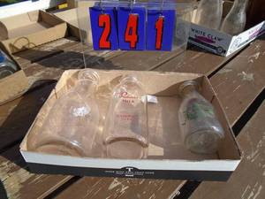 lot 241 image: Flat of milk bottles. As shown.