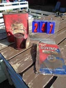 lot 247 image: Motor oil can & tin sign. As shown.