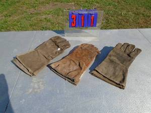 lot 311 image: Qty of 3 pairs leather welding gloves. As shown.