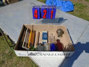 lot 421 image: Misc flat of rulers & glass bottles. As shown.