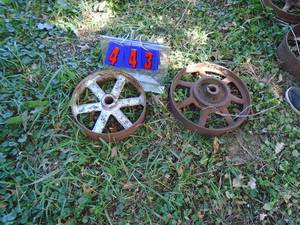 lot 443 image: Pair of cast wheelspulleys. As shown.