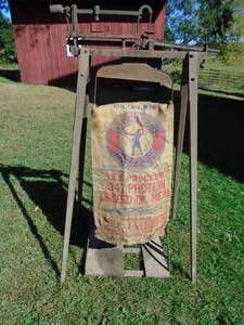 lot 101 image: Vintage wood frame feed sack scale. Very nice shape. As shown. THIS ITEM HAS A RESERVE.