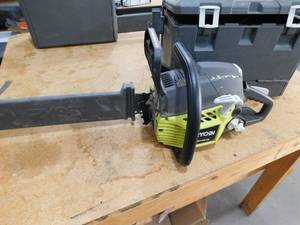 lot 124 image: RYOBI 18 in. 38cc 2-Cycle Gas Chainsaw with Heavy Duty Case