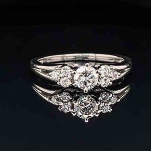 Timeless 0.60ctw Diamond Round Solitaire Cluster Wedding Ring in Platinum $2500 Retail