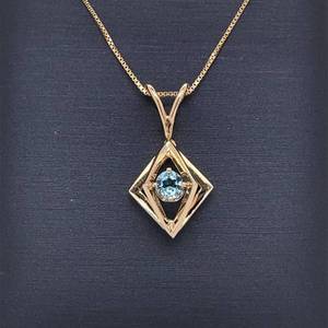 Light Blue Topaz Orbital Galaxy 3D Dimensional Pendant in 14k Yellow Gold